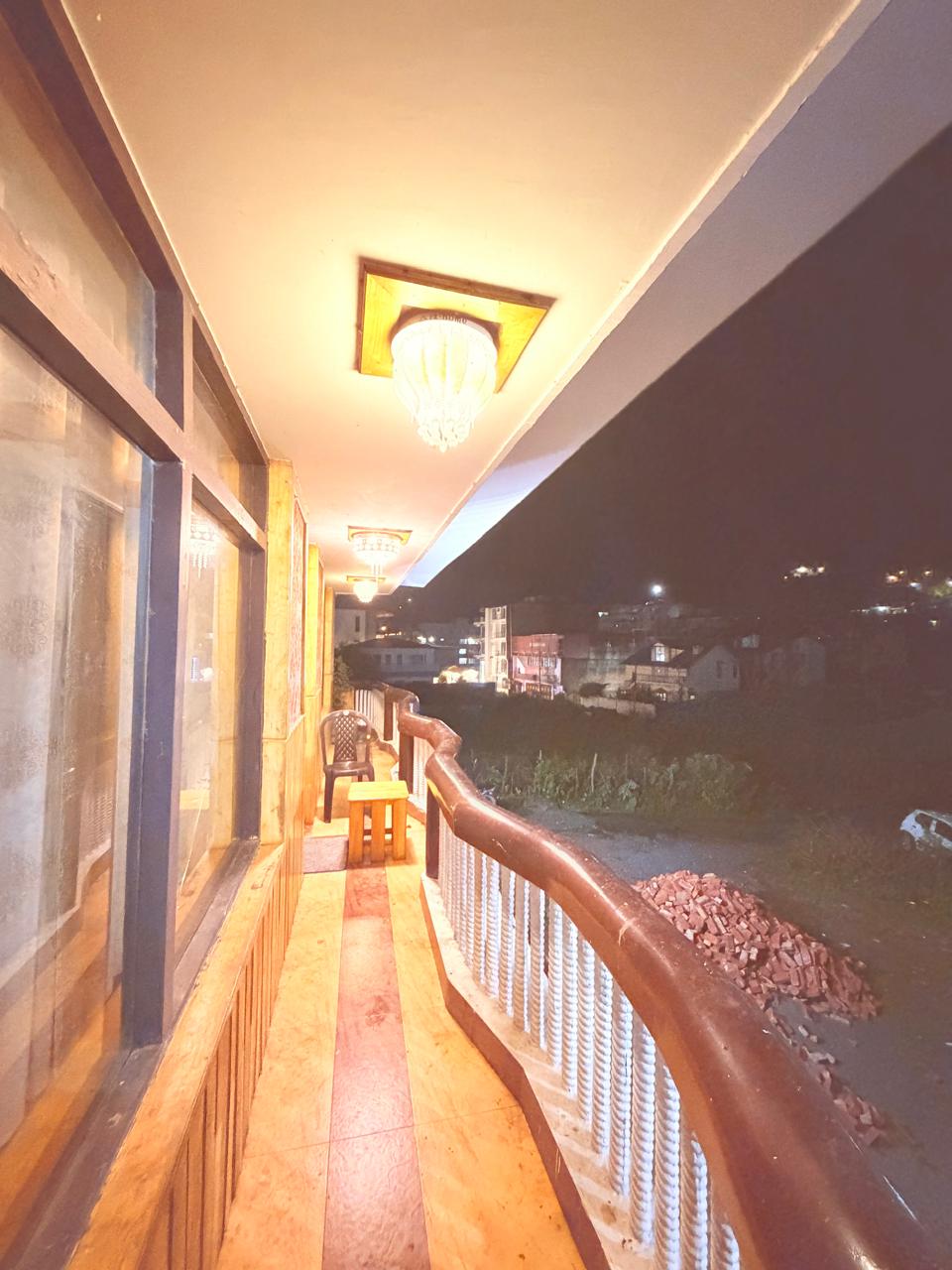 Balcony at The Central House at night