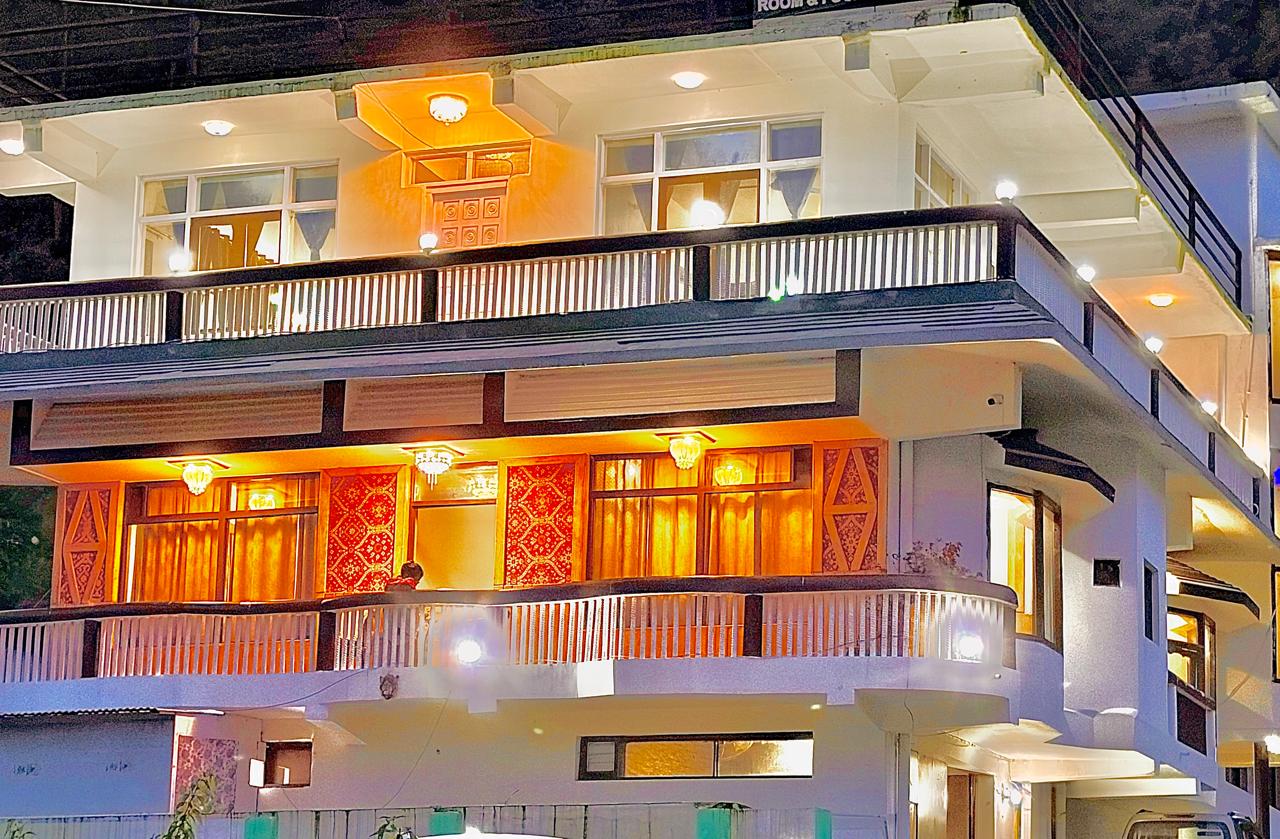 Balcony at The Central House, lit up at night